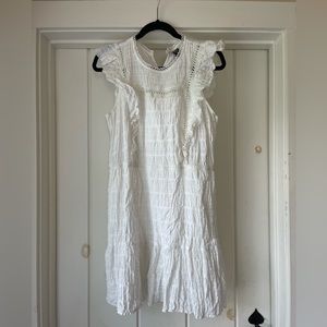 White dress. Ruffles.